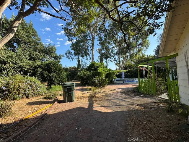 a view of a street with houses on both side
