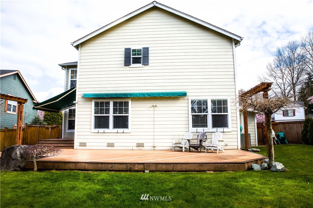 311 Edmonds Avenue Southeast Renton, WA 98056 - Photo 22 of 22 a front view of a house with a yard