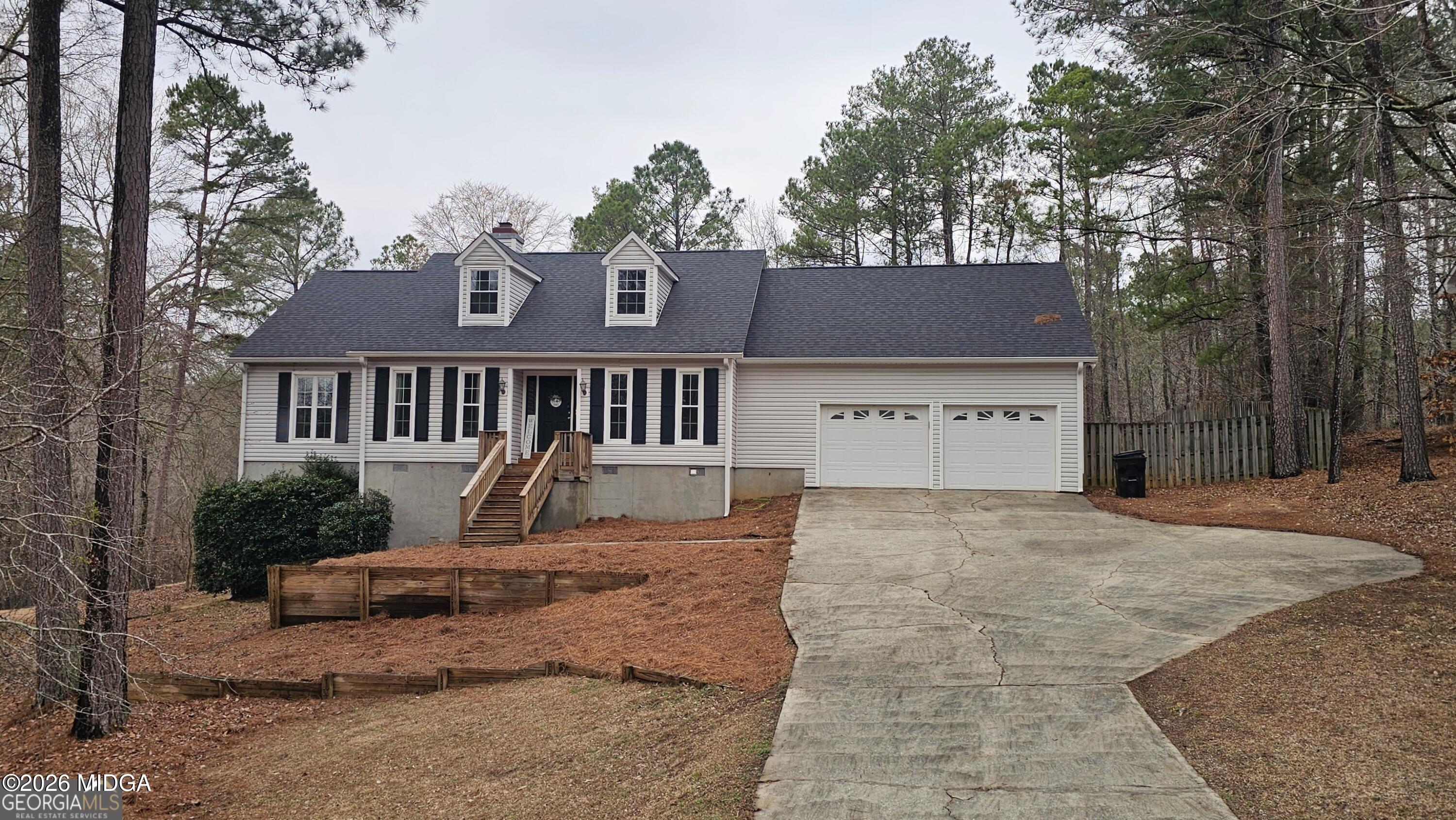 306 Lakeridge Court Macon, GA 31211 - Photo 14 of 14 a view of a house with a patio