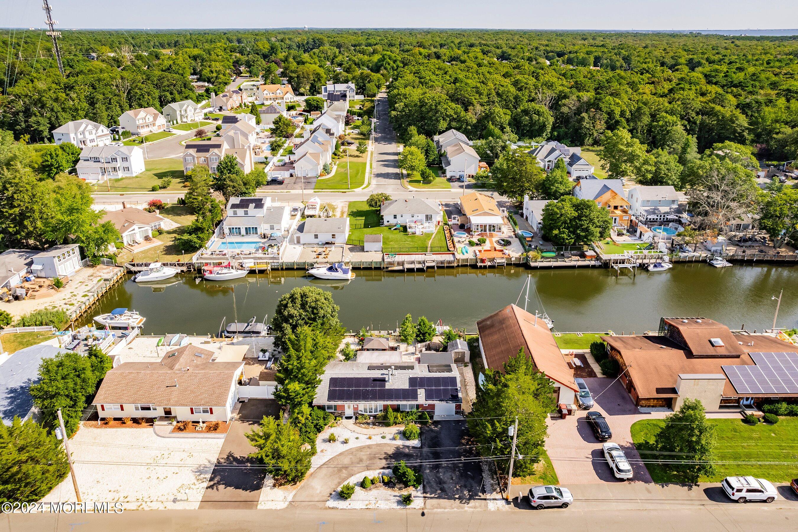 31 Cedar Run Road Bayville, NJ 08721 - Photo 2 of 34 an aerial view of a houses with outdoor space