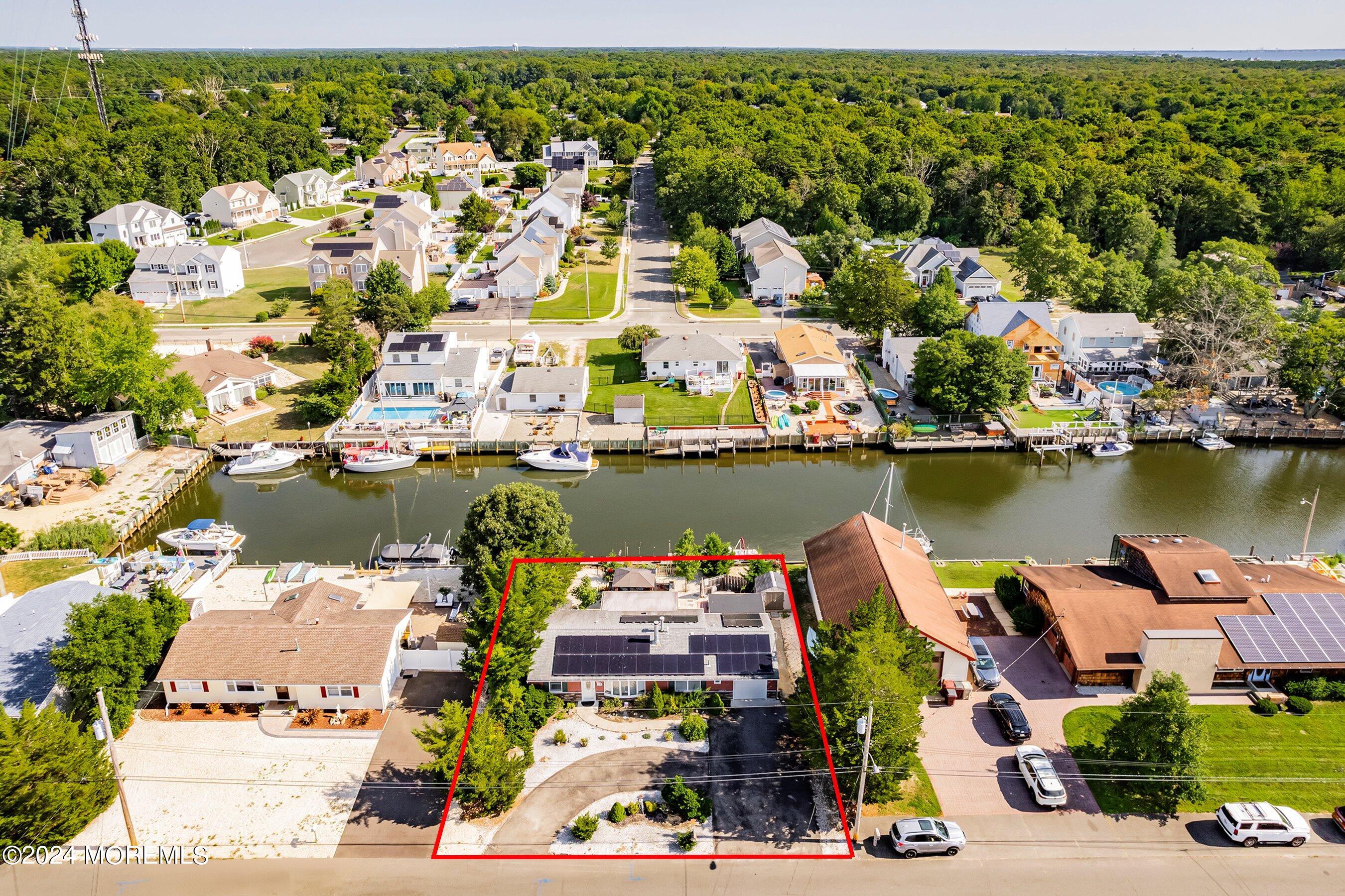 31 Cedar Run Road Bayville, NJ 08721 - Photo 3 of 34 an aerial view of a houses with outdoor space