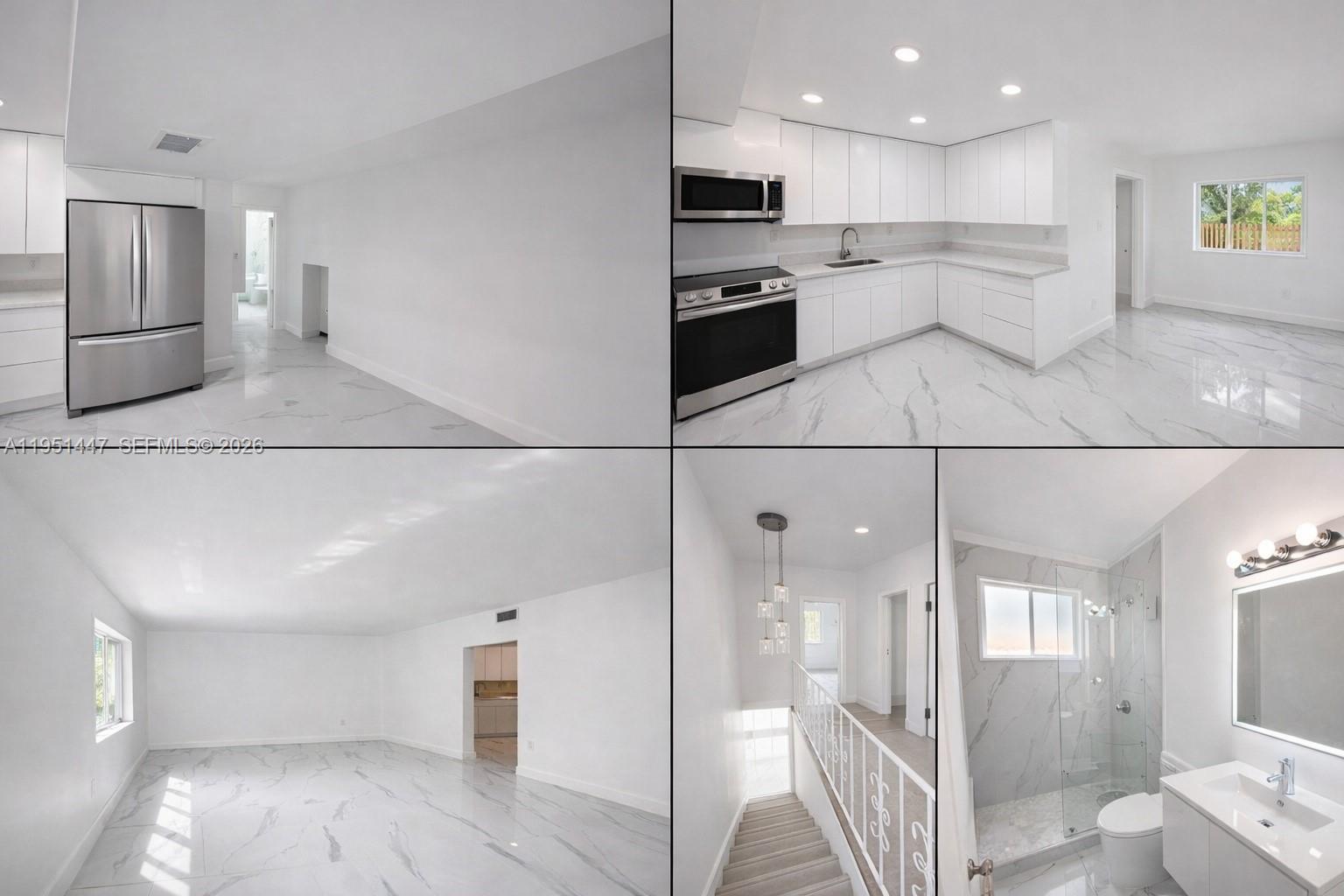 236 Northeast 55th Terrace, Unit 236 Miami, FL 33137 - Photo 10 of 10 a kitchen with stainless steel appliances granite countertop a refrigerator and a sink