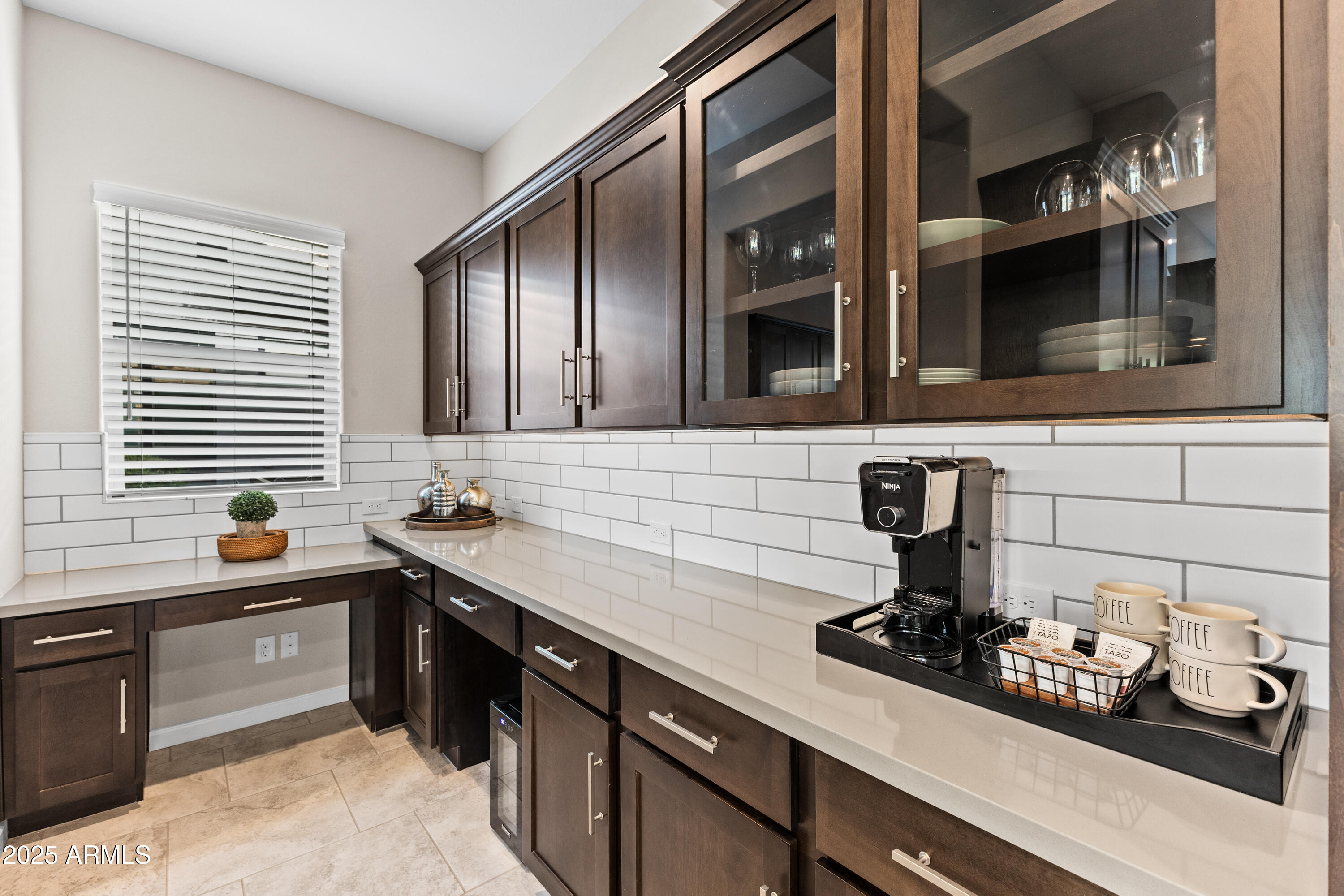 17621 Blaze Lane Rio Verde, AZ 85263 - Photo 13 of 57 a kitchen with stainless steel appliances a sink stove and cabinets