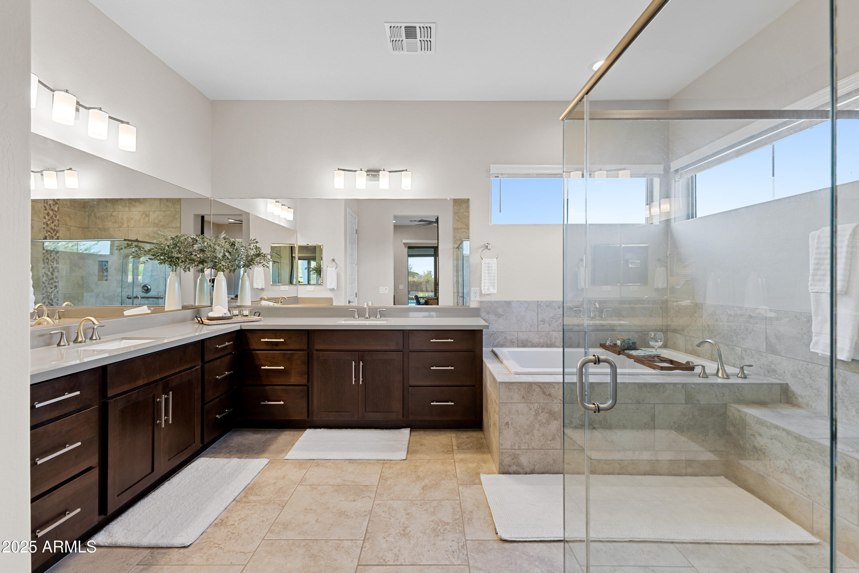 17621 Blaze Lane Rio Verde, AZ 85263 - Photo 15 of 57 a large bathroom with a granite countertop sink a toilet a mirror and bathtub