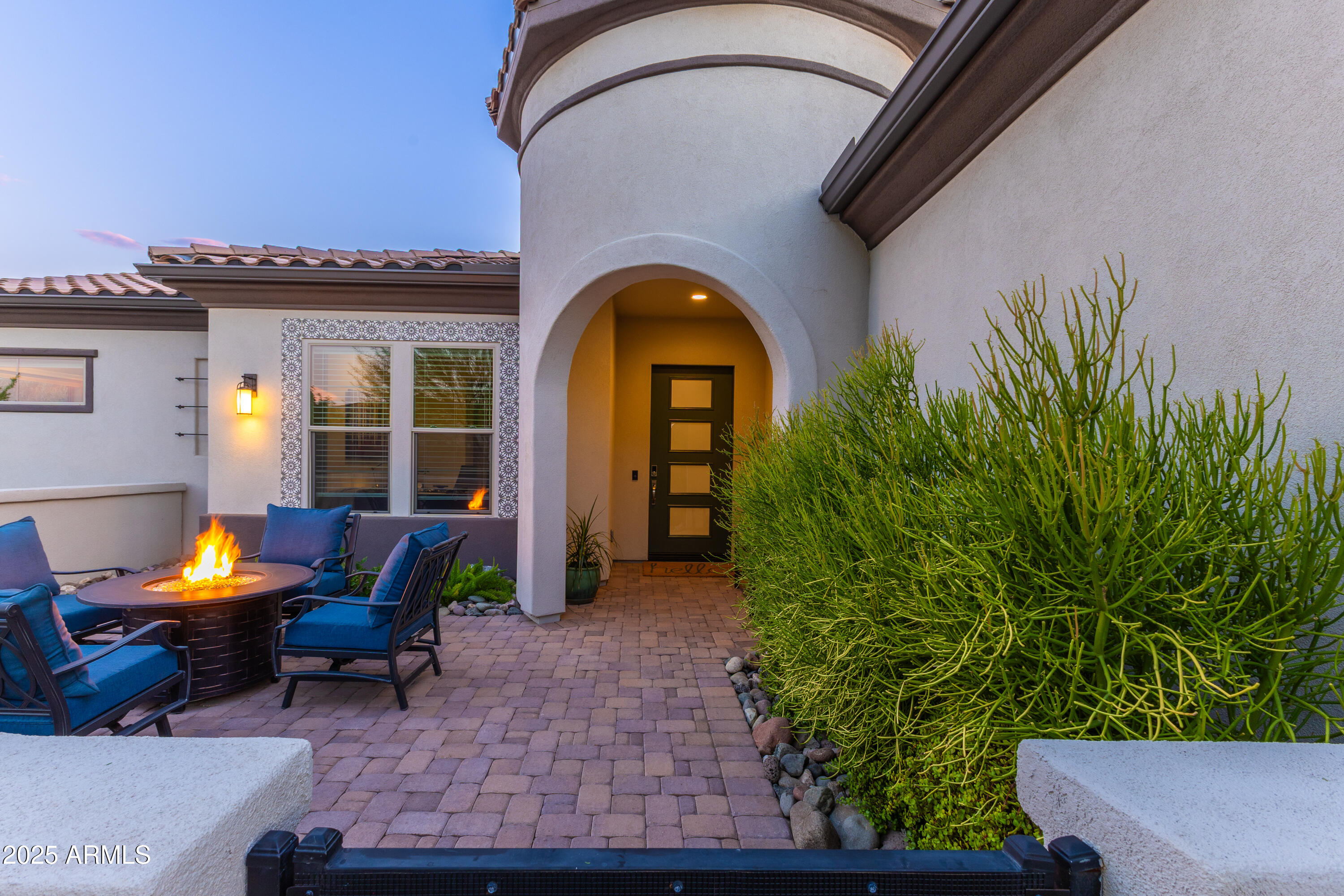 17621 Blaze Lane Rio Verde, AZ 85263 - Photo 2 of 57 a view of a chair and tables in patio of the house