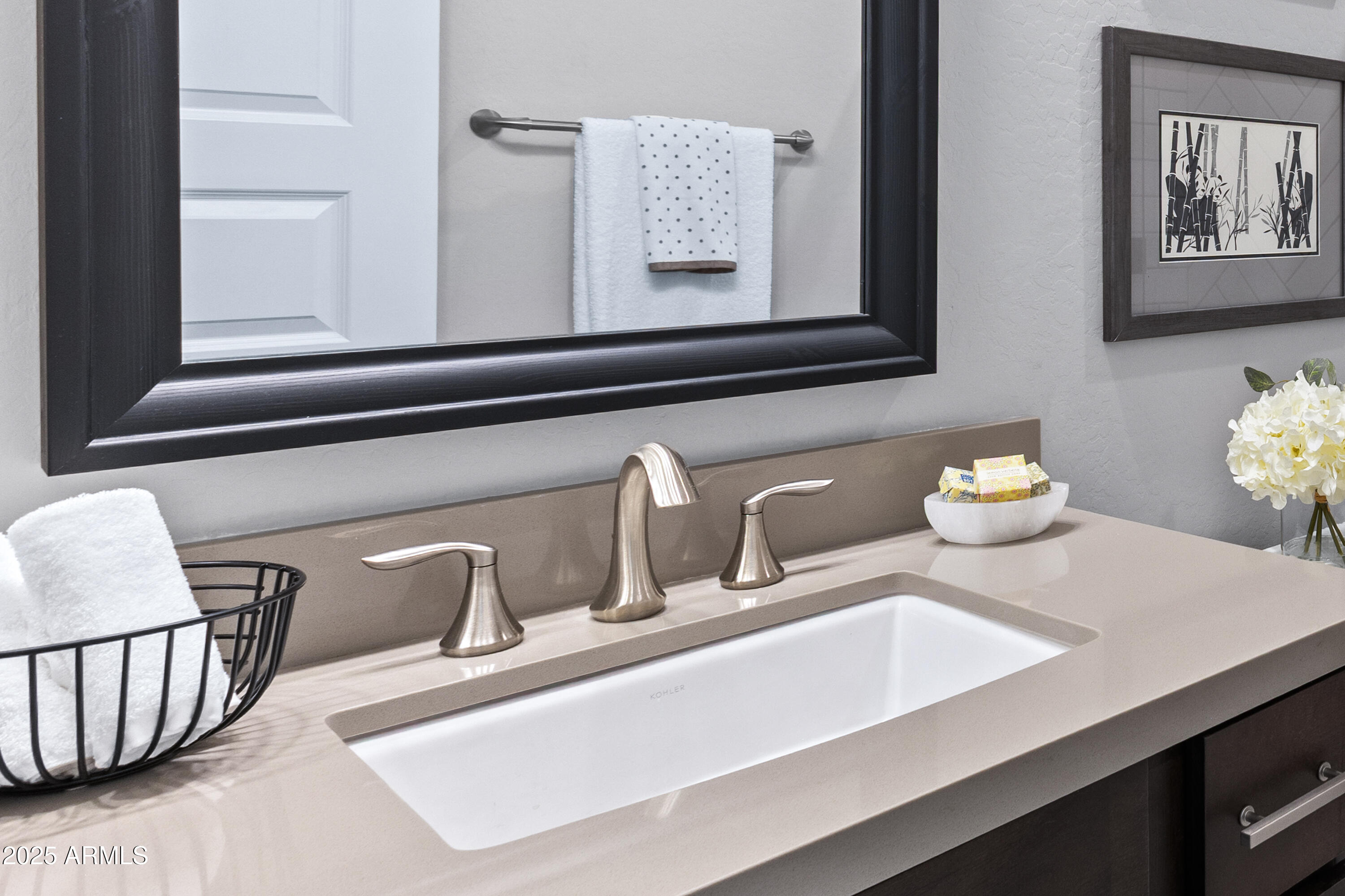 17621 Blaze Lane Rio Verde, AZ 85263 - Photo 22 of 57 a bathroom with a sink and a mirror