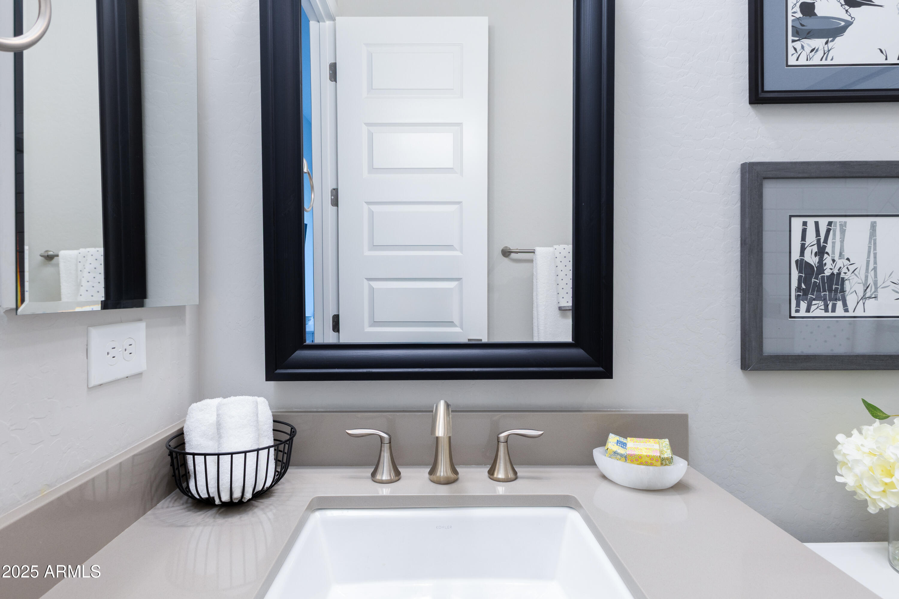 17621 Blaze Lane Rio Verde, AZ 85263 - Photo 23 of 57 a bathroom with a sink and a mirror