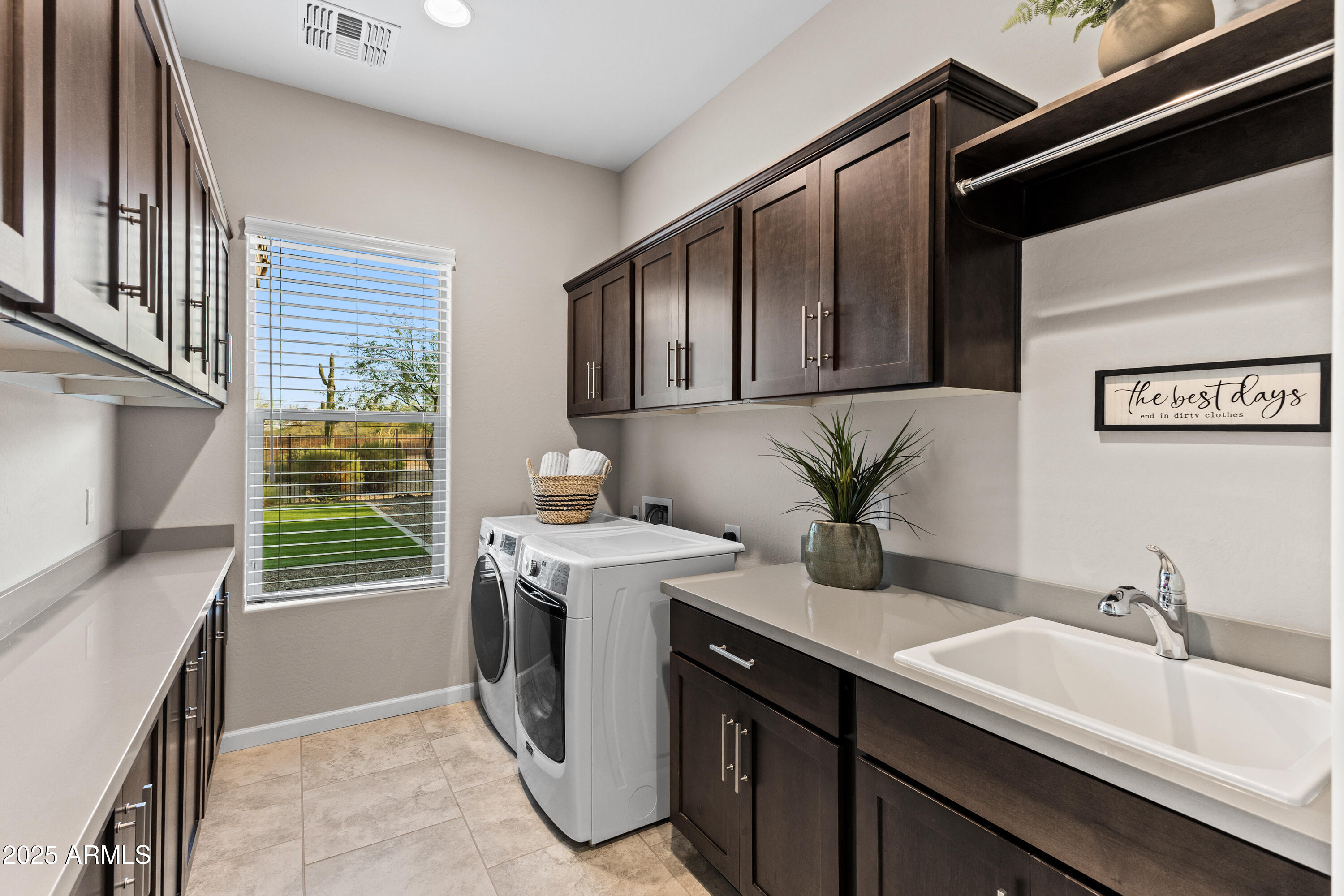 17621 Blaze Lane Rio Verde, AZ 85263 - Photo 28 of 57 a kitchen with a sink and cabinets