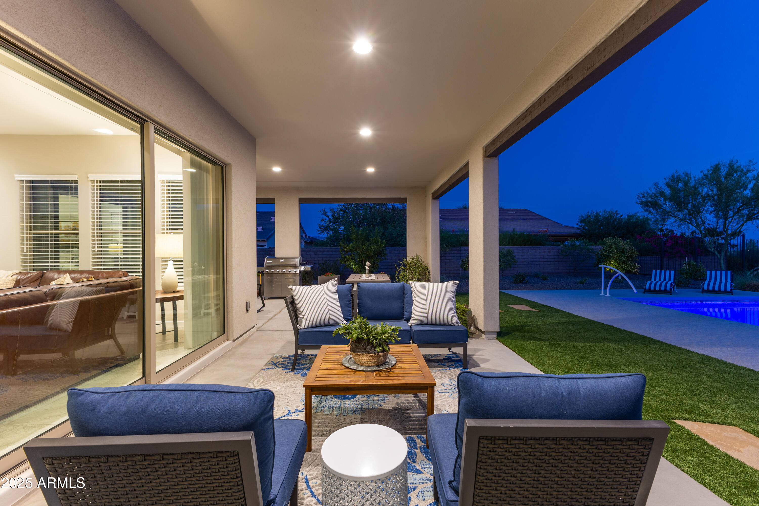 17621 Blaze Lane Rio Verde, AZ 85263 - Photo 31 of 57 a living room with furniture and a yard