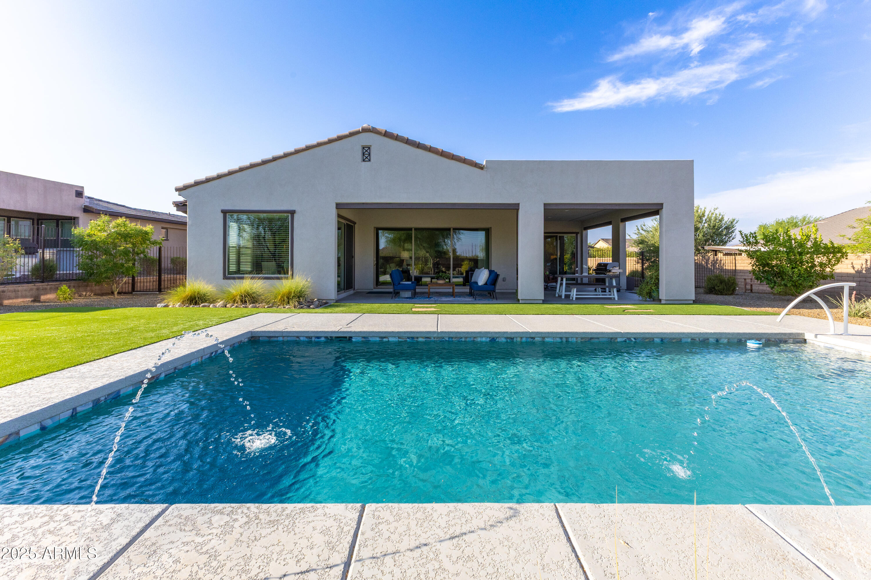 17621 Blaze Lane Rio Verde, AZ 85263 - Photo 36 of 57 a view of a house with a swimming pool