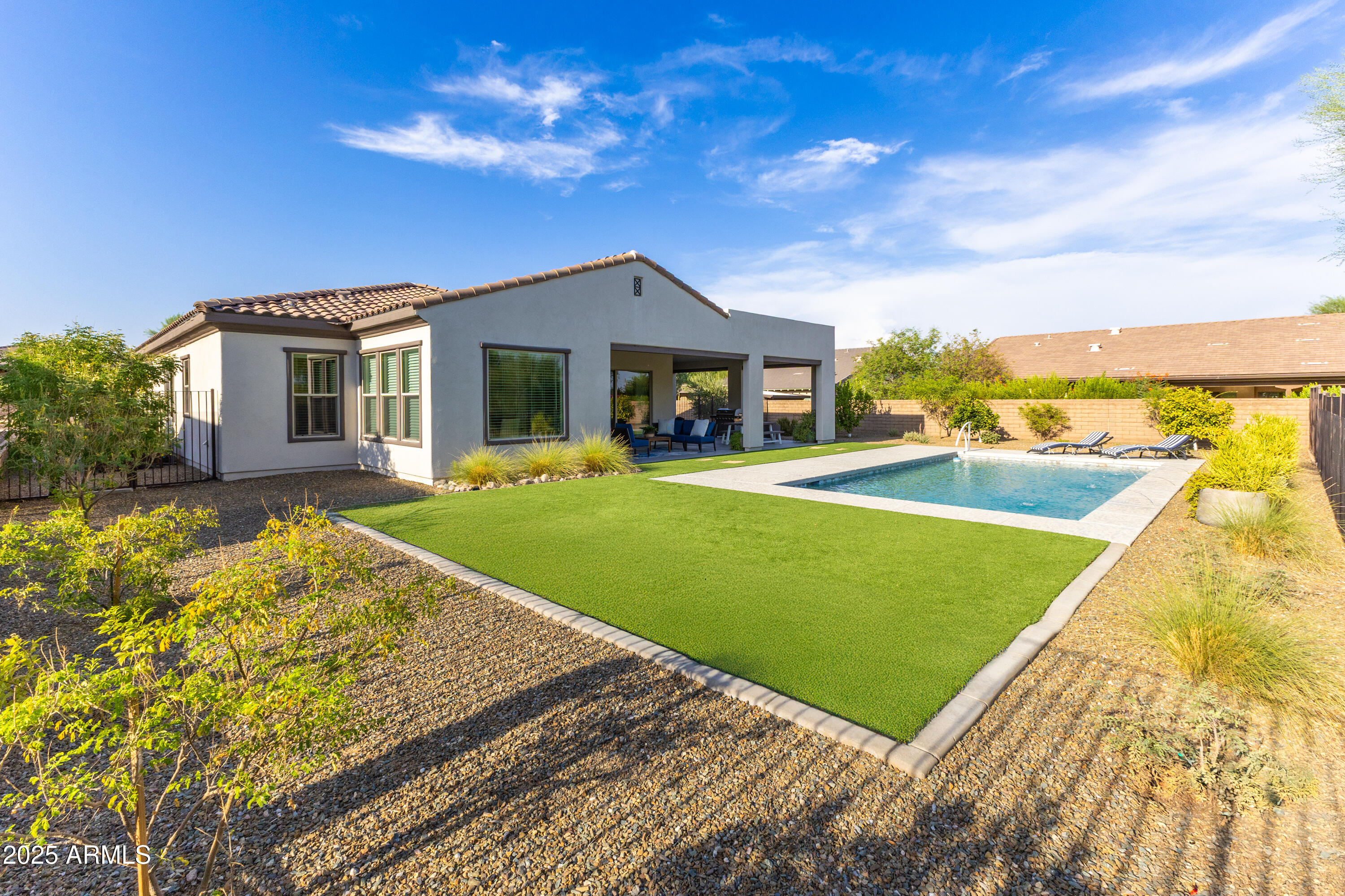 17621 Blaze Lane Rio Verde, AZ 85263 - Photo 38 of 57 a view of a house with a swimming pool