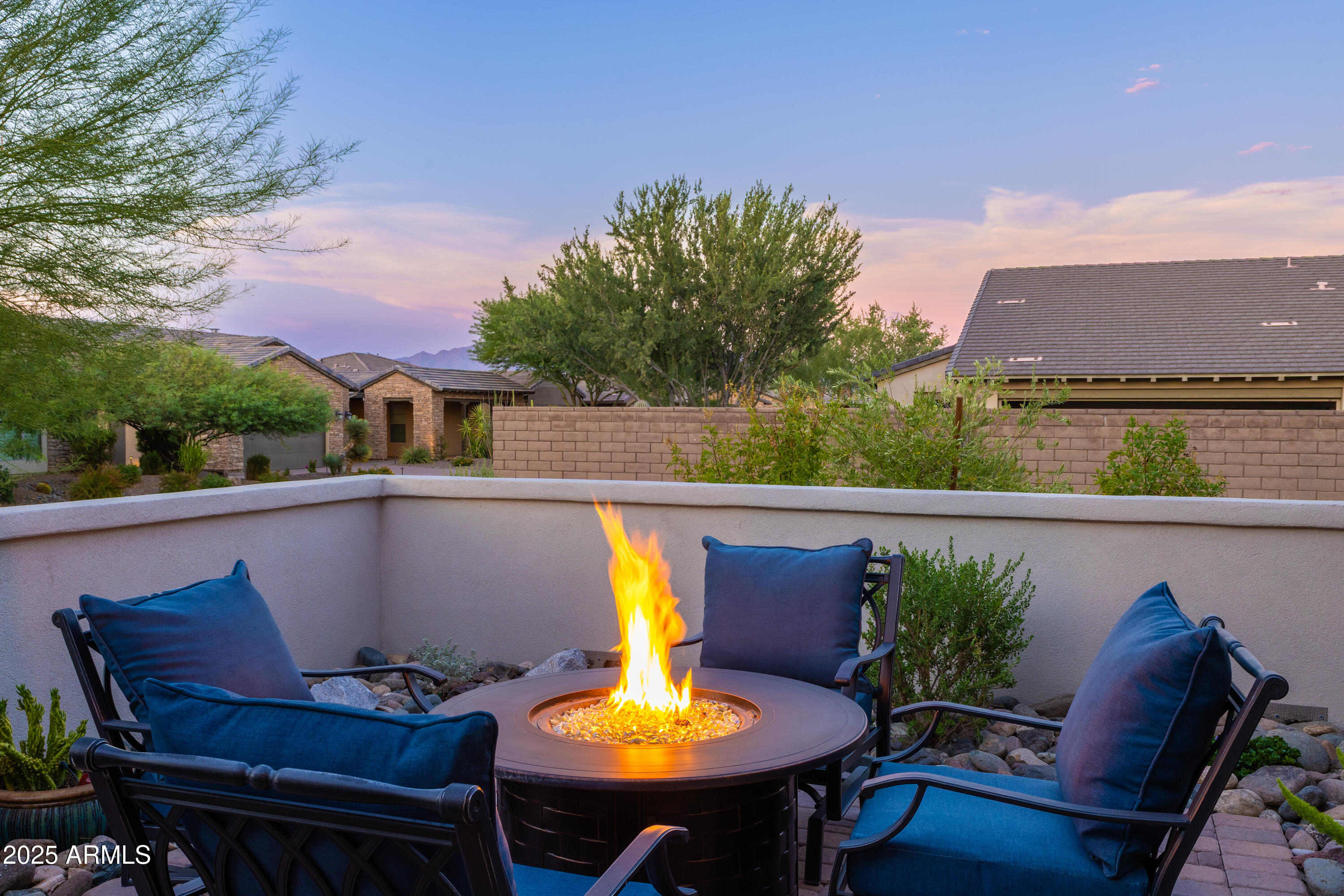 17621 Blaze Lane Rio Verde, AZ 85263 - Photo 4 of 57 a balcony with table and chairs