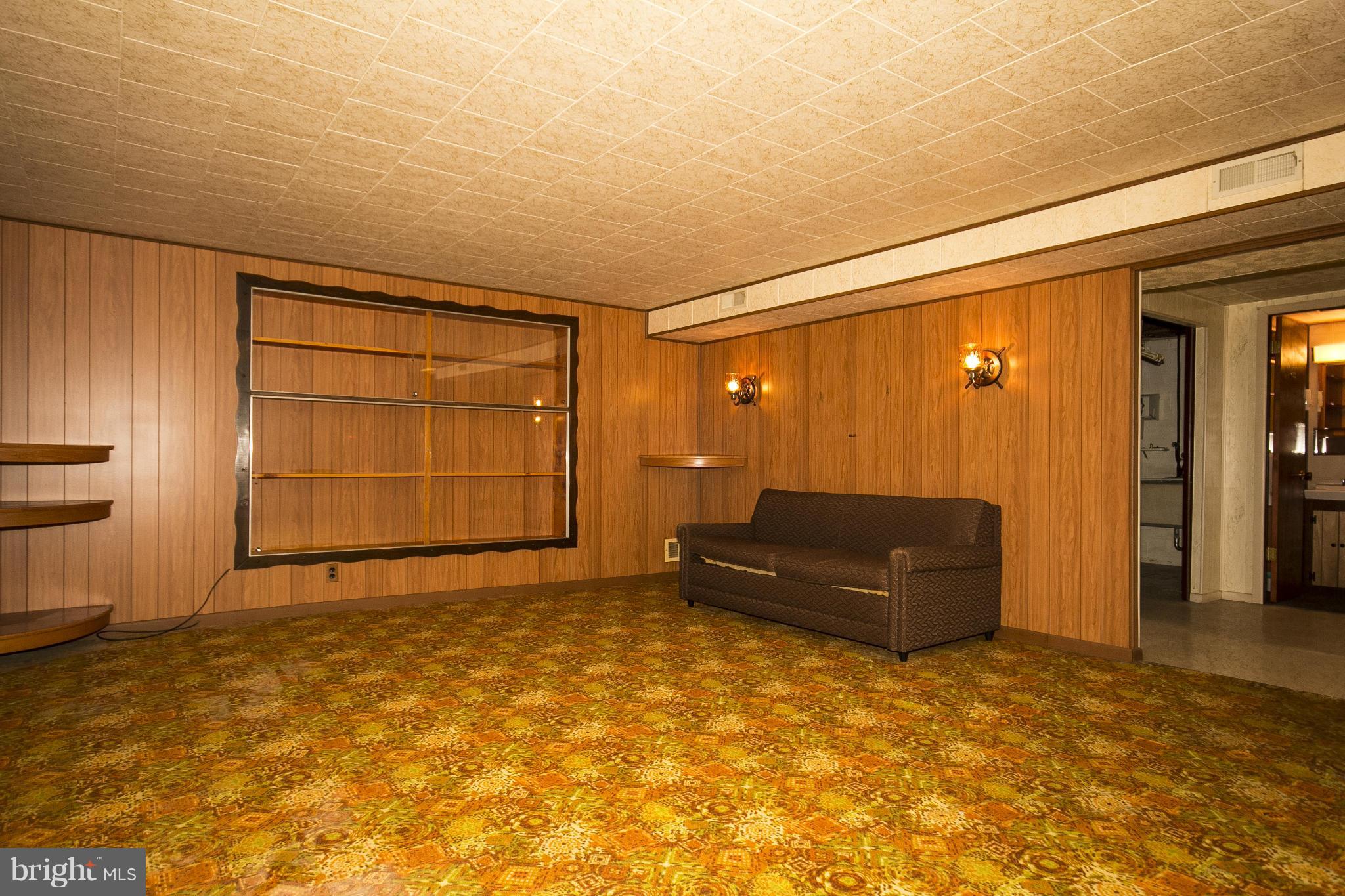 6313 Magdolena Road Baltimore, MD 21237 - Photo 22 of 30 an empty room with closet