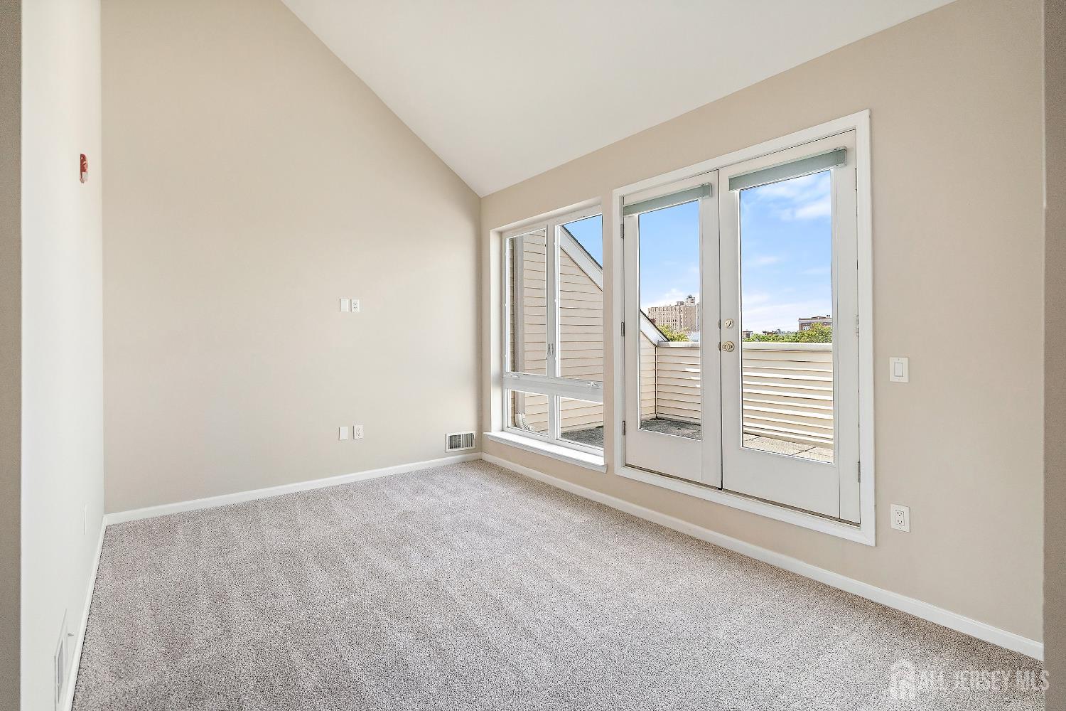 368 Rector Street, Unit 521 Perth Amboy, NJ 08861 - Photo 16 of 41 a view of an empty room with a window
