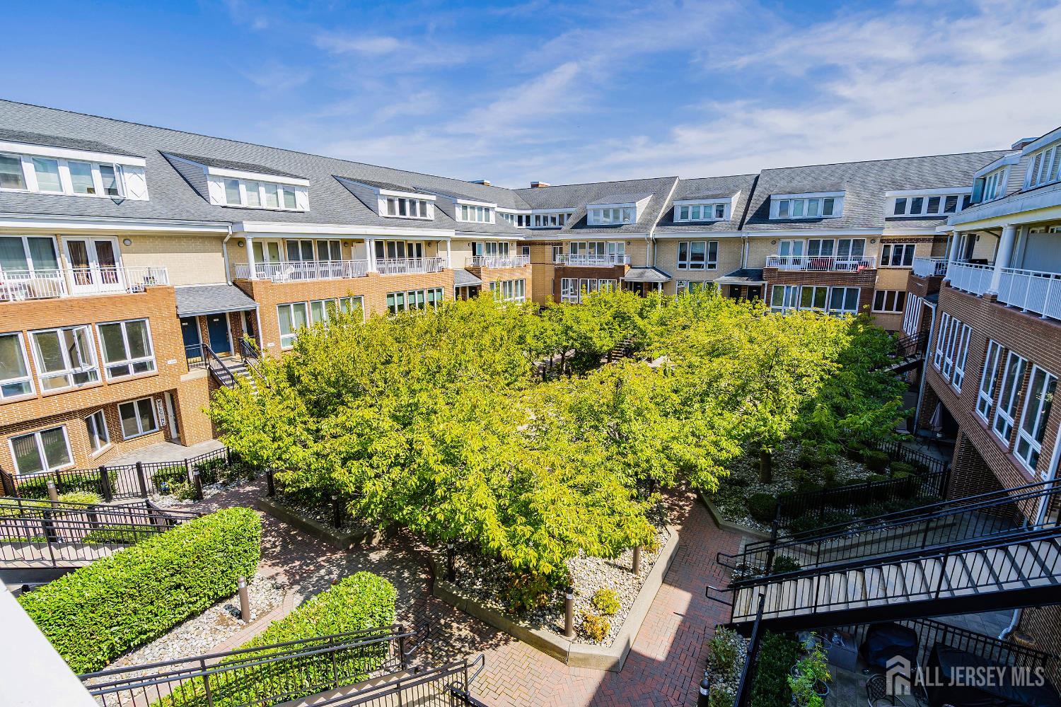 368 Rector Street, Unit 521 Perth Amboy, NJ 08861 - Photo 24 of 41 a front view of a house with garden