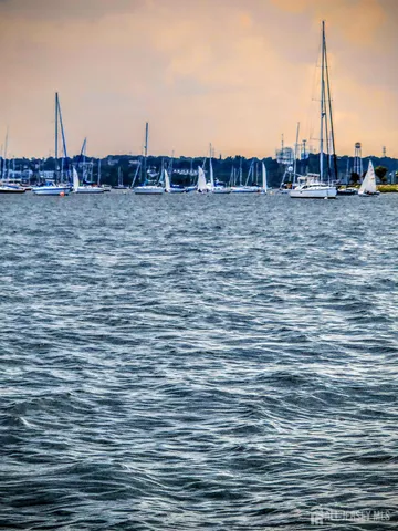 a view of houses with a street