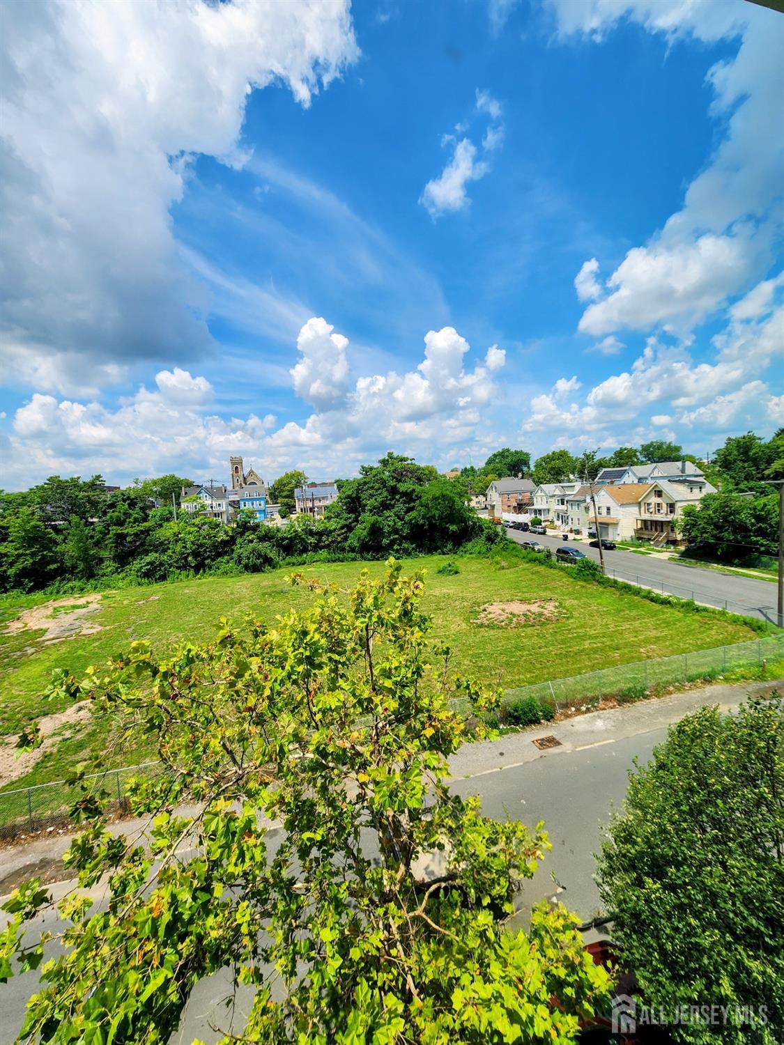 368 Rector Street, Unit 521 Perth Amboy, NJ 08861 - Photo 37 of 41 a view of a lake with a big yard