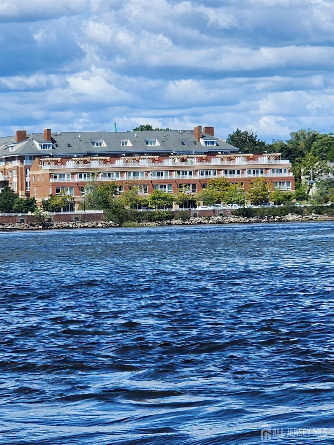 368 Rector Street, Unit 521 Perth Amboy, NJ 08861 - Photo 38 of 41 a view of an ocean with city