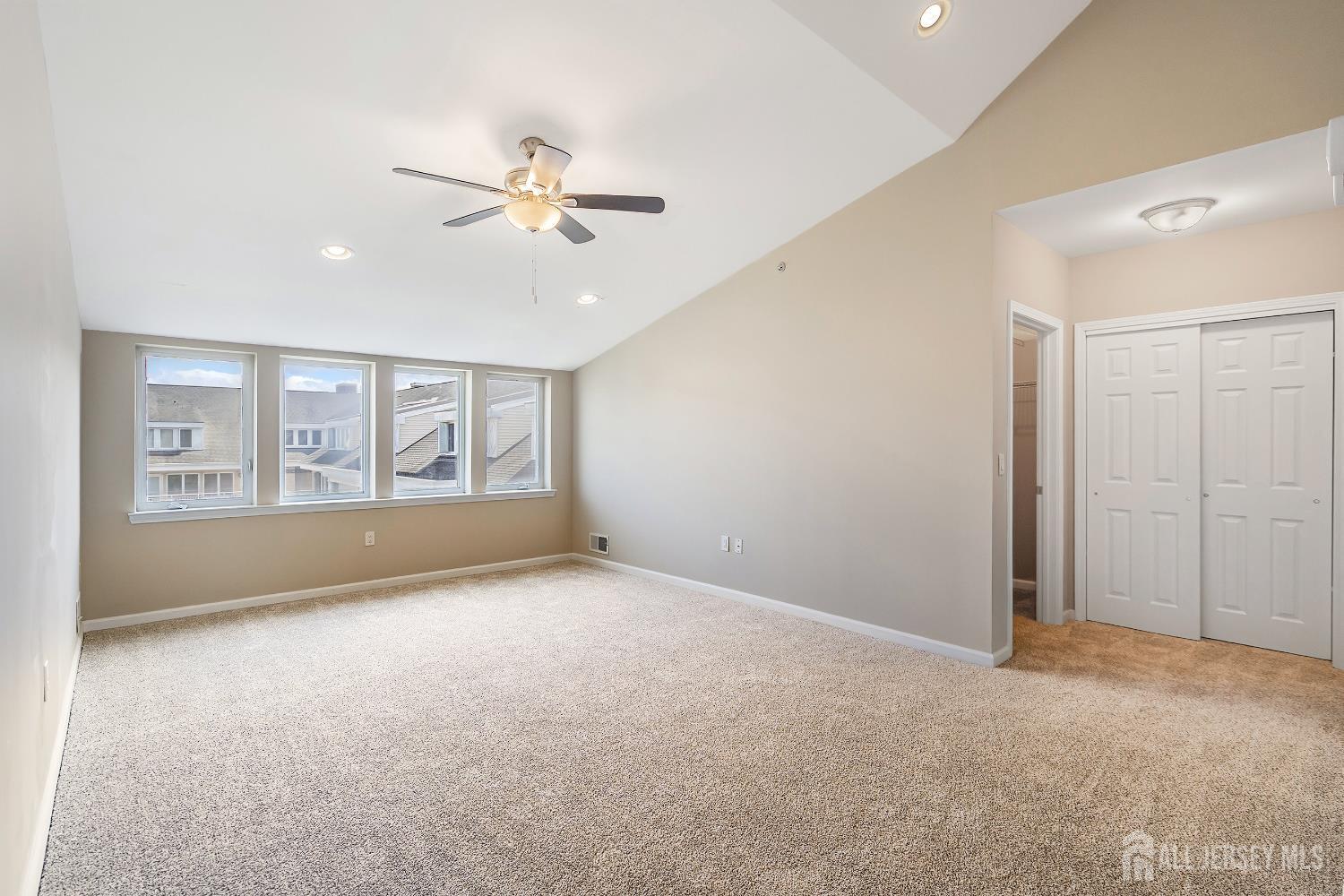368 Rector Street, Unit 521 Perth Amboy, NJ 08861 - Photo 4 of 41 a view of an empty room with a window
