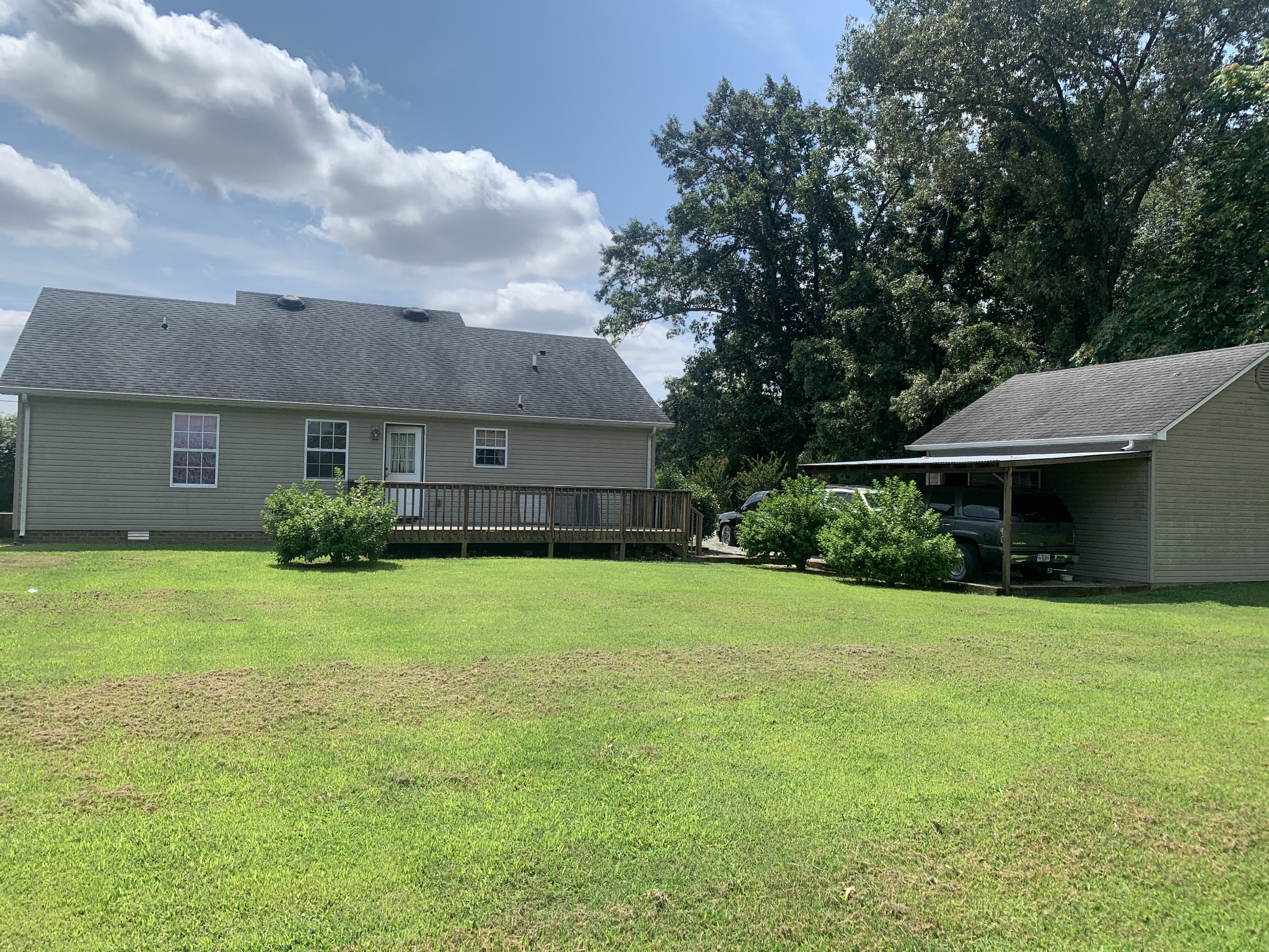 11 Myrick Road Flintville, TN 37335 - Photo 14 of 19 a front view of a house with a garden