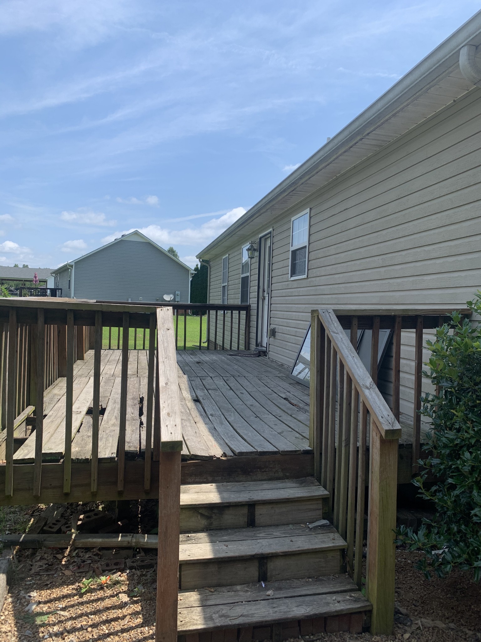 11 Myrick Road Flintville, TN 37335 - Photo 15 of 19 a view of backyard with deck and outdoor seating
