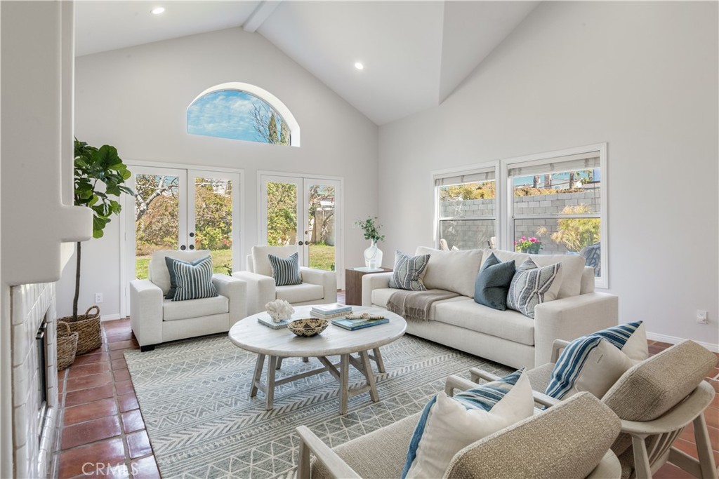 1545 5th Street Manhattan Beach, CA 90266 - Photo 2 of 3 a living room with furniture and a large window