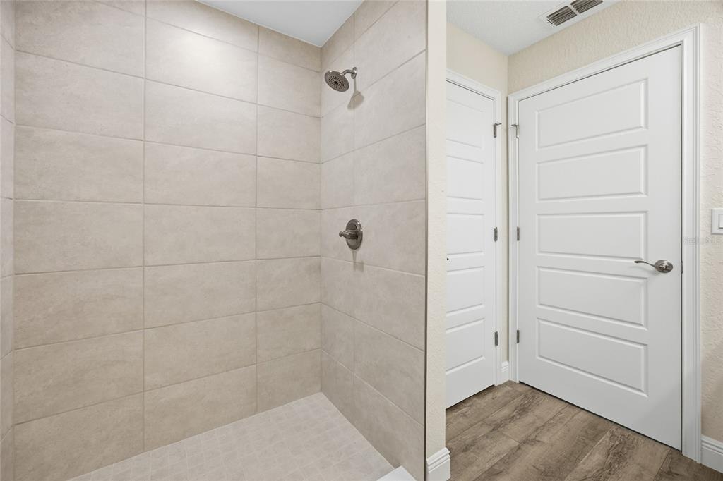 6762 Cherry Road Ocala, FL 34472 - Photo 12 of 29 a bathroom with a shower