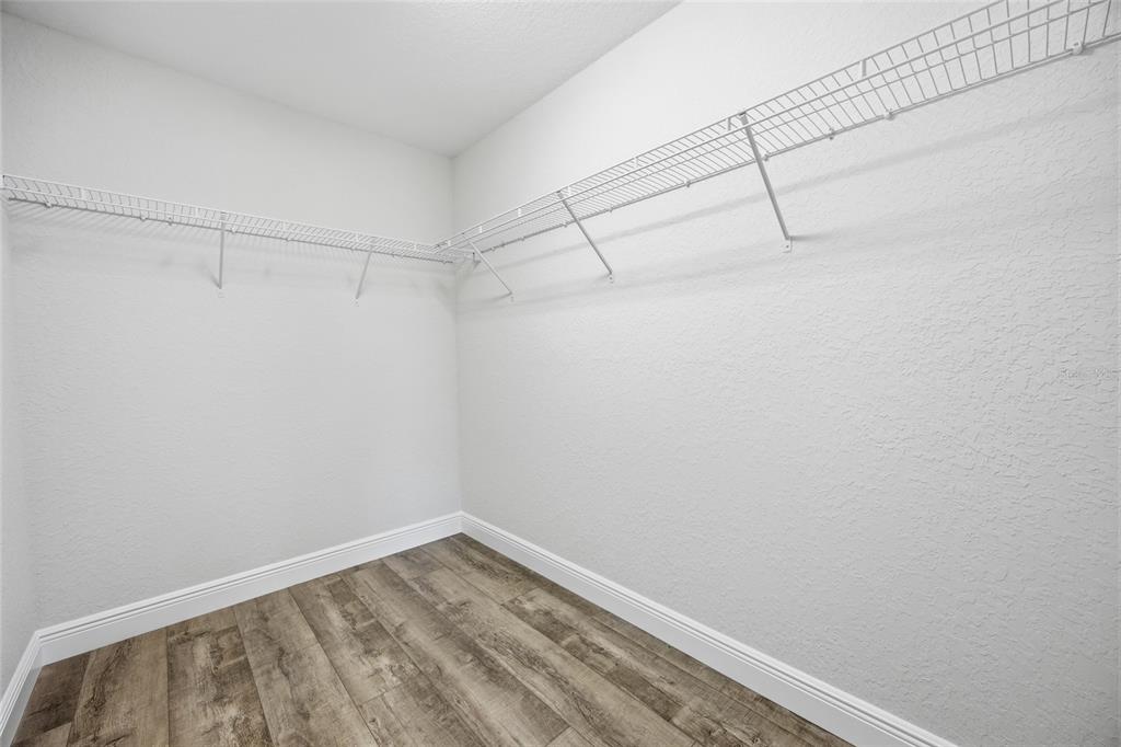 6762 Cherry Road Ocala, FL 34472 - Photo 15 of 29 a view of a room with racks on the wall