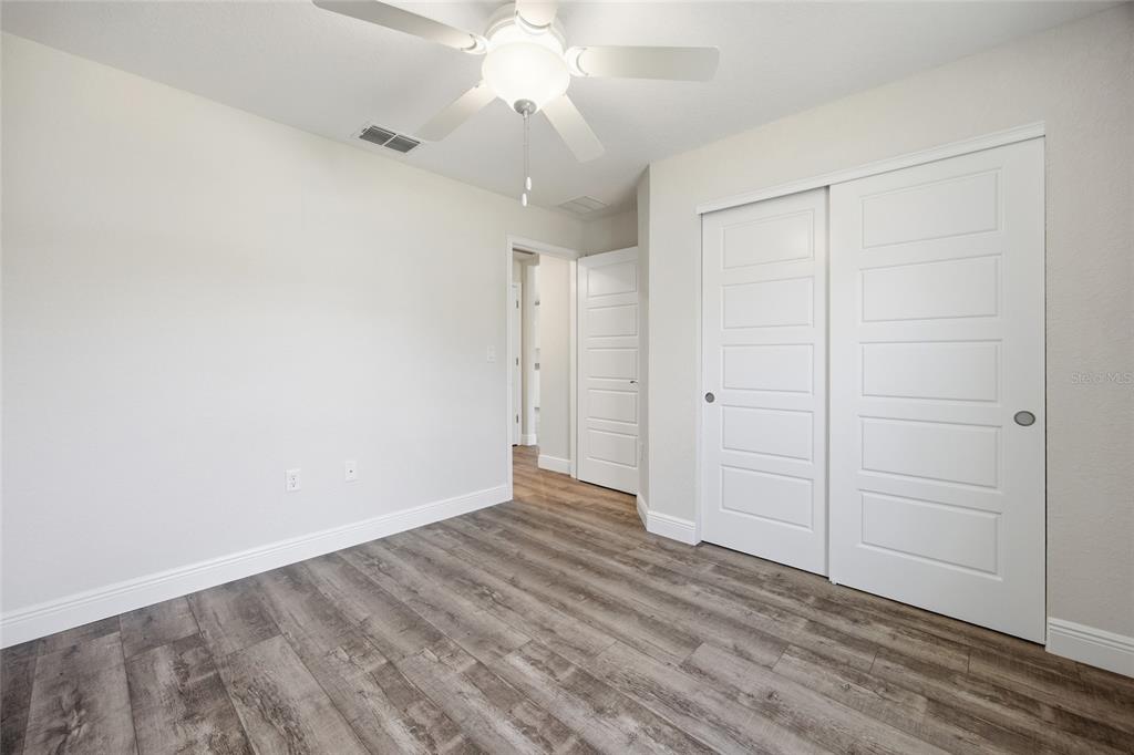 6762 Cherry Road Ocala, FL 34472 - Photo 17 of 29 wooden floor in an empty room