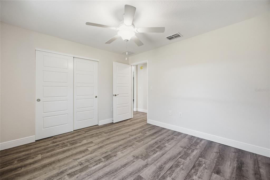 6762 Cherry Road Ocala, FL 34472 - Photo 20 of 29 wooden floor in an empty room