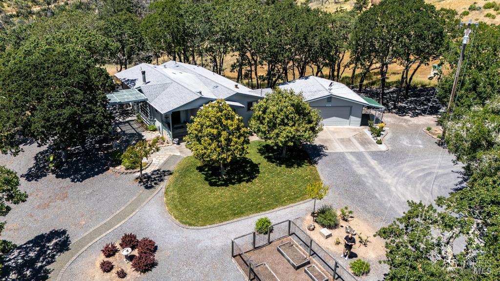 6707 Badger Creek Road Santa Rosa, CA 95409 - Photo 1 of 53 an aerial view of a house with a yard and garden