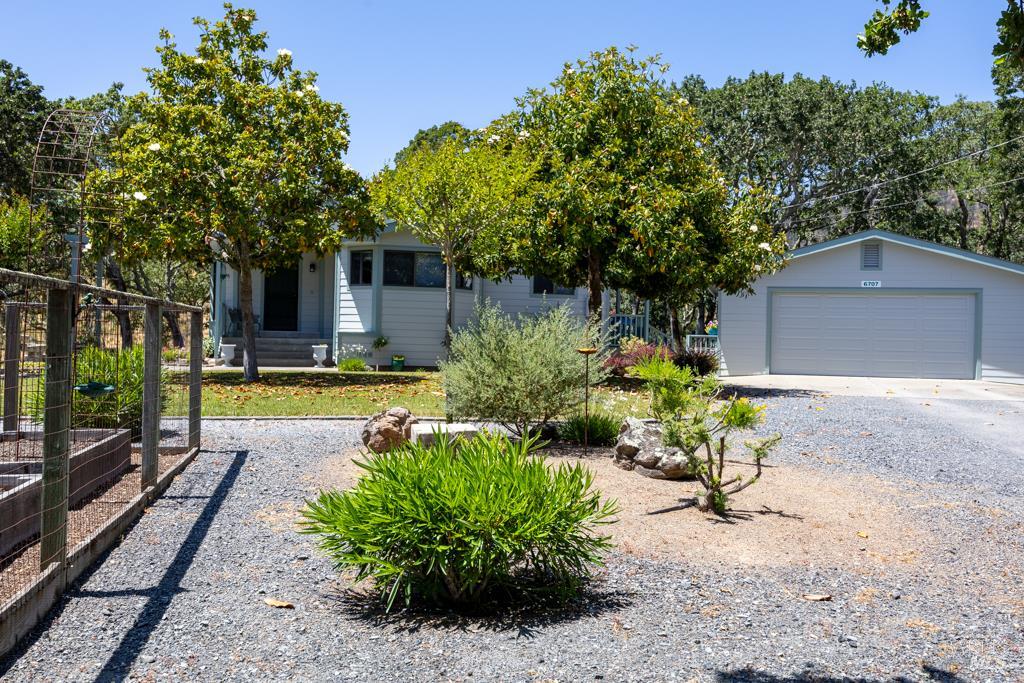 6707 Badger Creek Road Santa Rosa, CA 95409 - Photo 26 of 53 a view of a house with backyard and garden