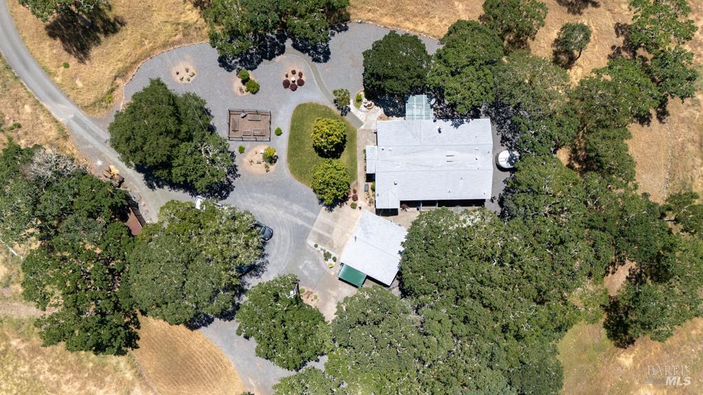 6707 Badger Creek Road Santa Rosa, CA 95409 - Photo 38 of 53 an aerial view of a house with a yard and garden