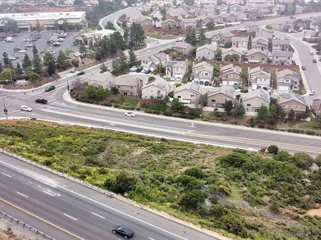 a street sign on a brick wall