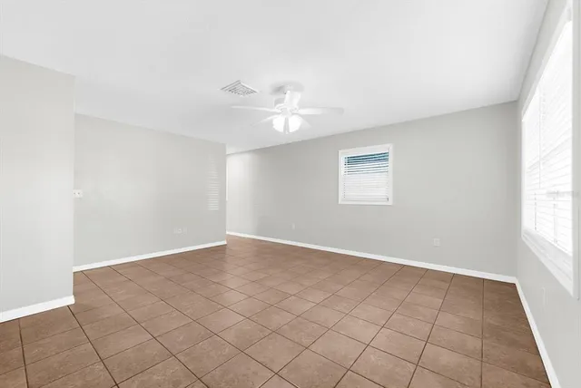 a kitchen with stainless steel appliances a refrigerator sink and cabinets