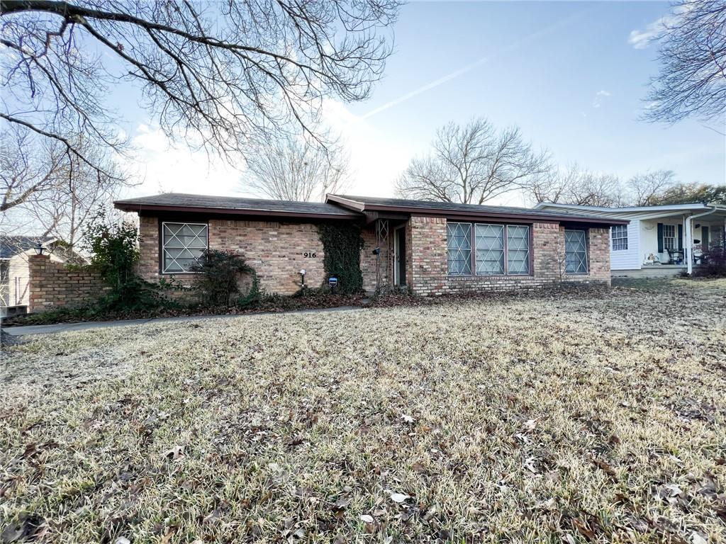 916 North 43rd Street Waco, TX 76710 - Photo 1 of 1 a front view of house with yard