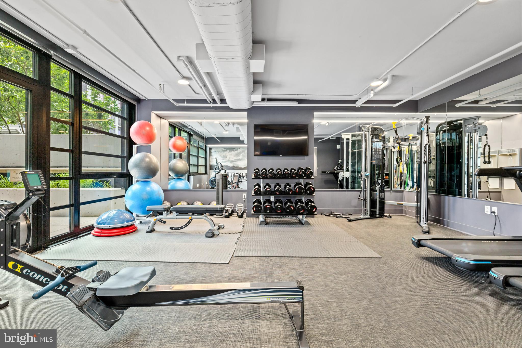 1300 4th Street Southeast, Unit 404 Washington, DC 20003 - Photo 39 of 51 a room with gym equipment