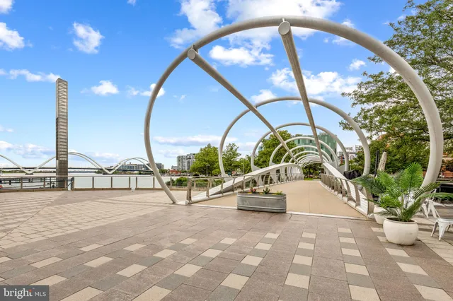 a view of a roof deck with furniture