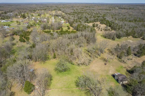 a view of outdoor space and a yard