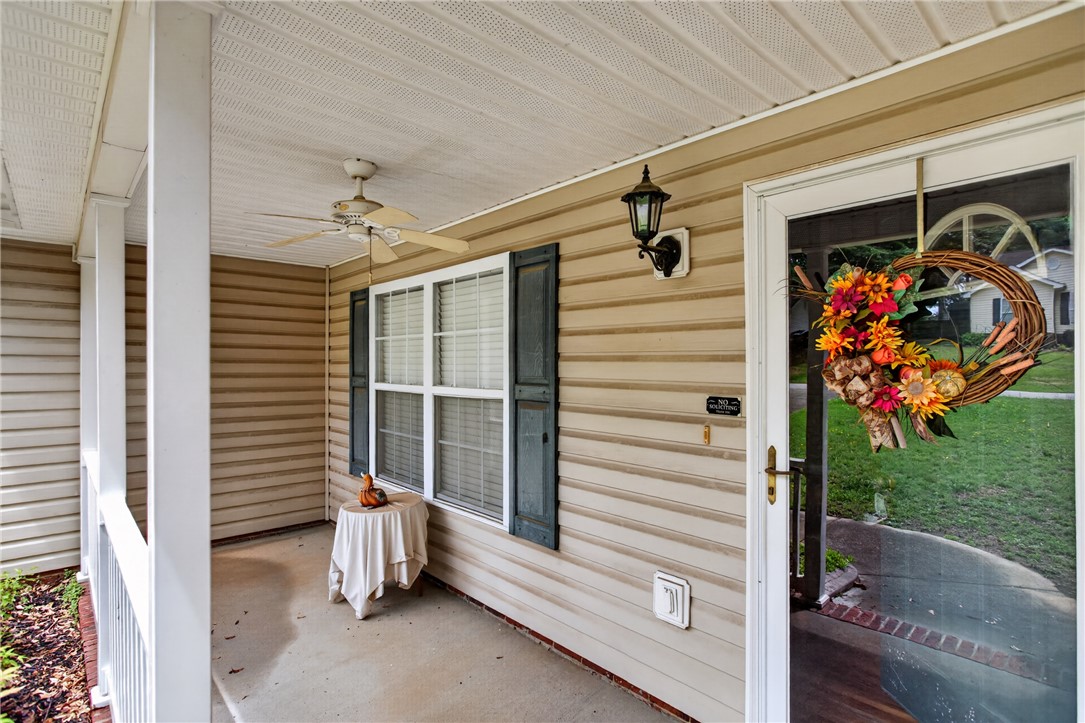 207 Hunters Lane Anderson, SC 29625 - Photo 3 of 46 A welcoming front porch features ample space for outdoor living.