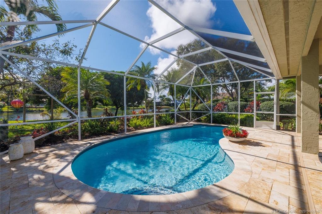 1976 Southwest Oak Ridge Road Palm City, FL 34990 - Photo 36 of 65 a outdoor view with a sitting space