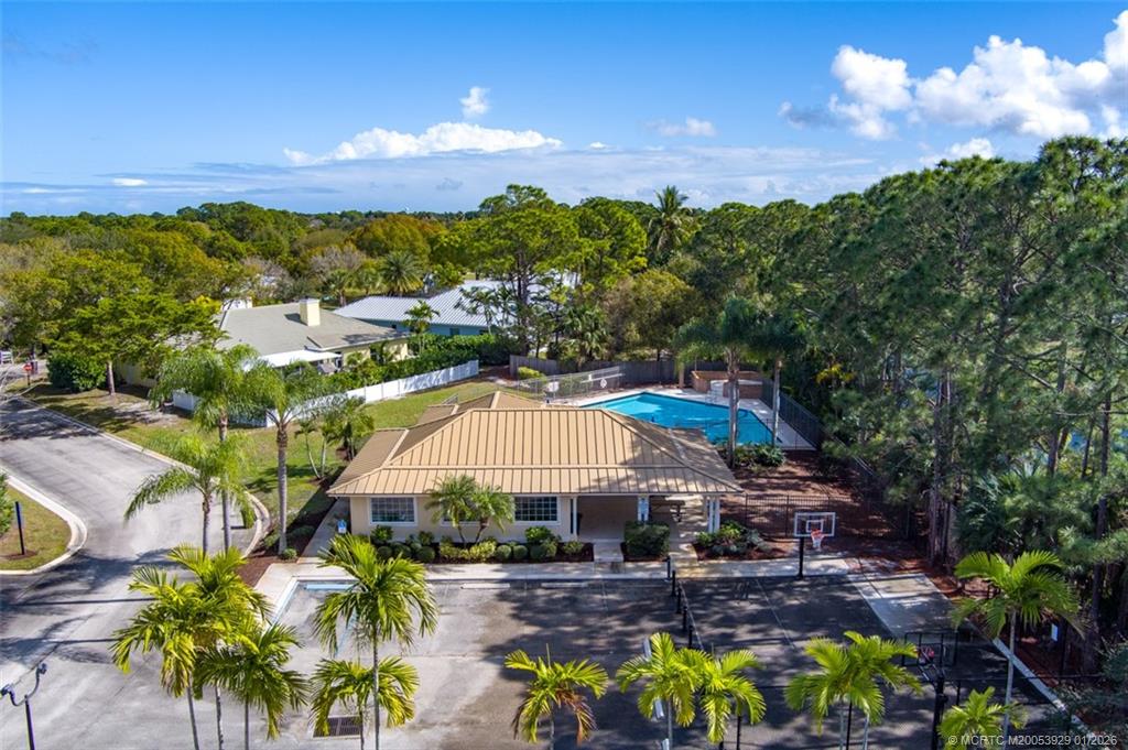 1976 Southwest Oak Ridge Road Palm City, FL 34990 - Photo 60 of 65 a view of a swimming pool with a patio