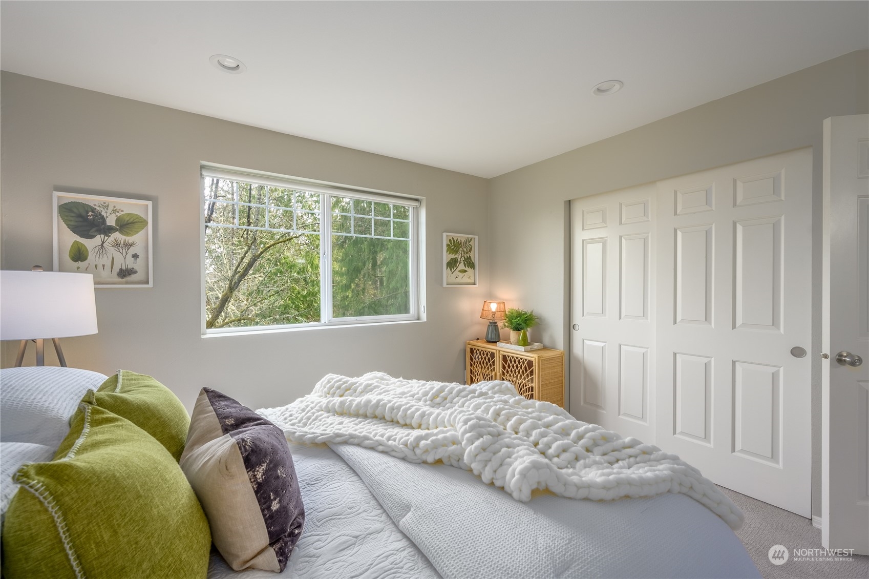 18501 Southeast Newport Way, Unit H236 Issaquah, WA 98027 - Photo 11 of 25 a bedroom with a bed and a window