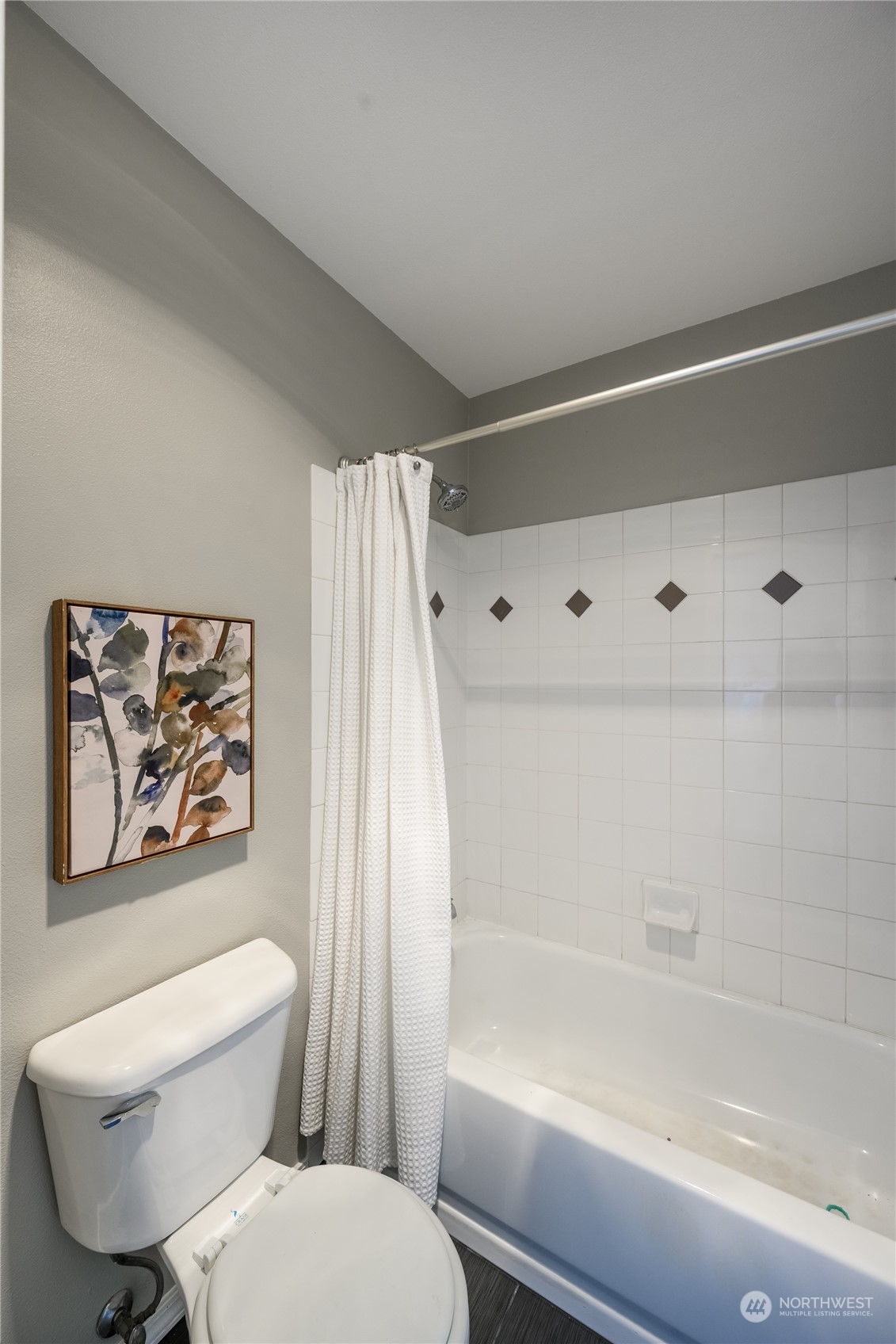 18501 Southeast Newport Way, Unit H236 Issaquah, WA 98027 - Photo 14 of 25 a bathroom with a toilet and a shower