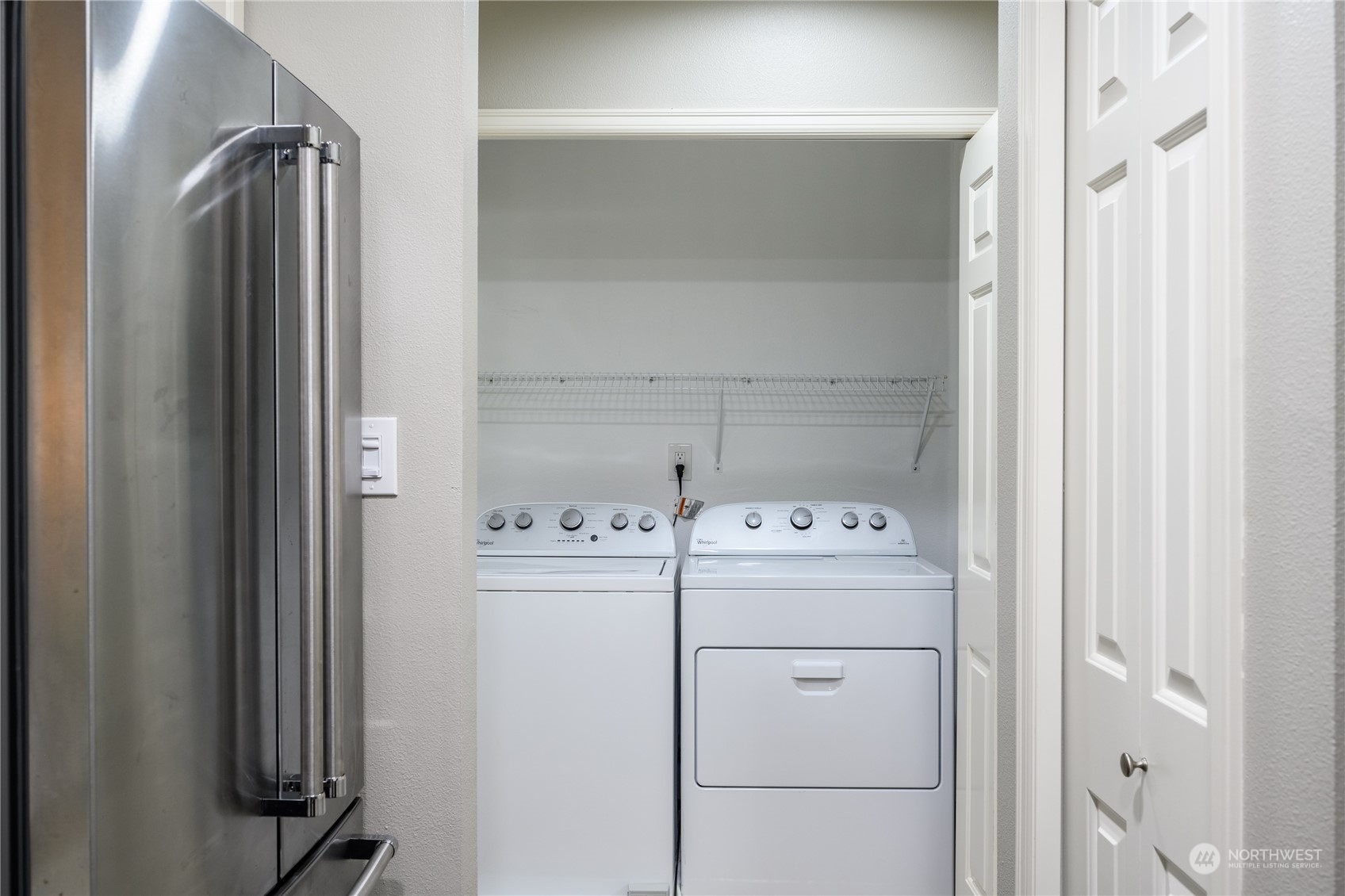 18501 Southeast Newport Way, Unit H236 Issaquah, WA 98027 - Photo 19 of 25 a utility room with dryer and washer