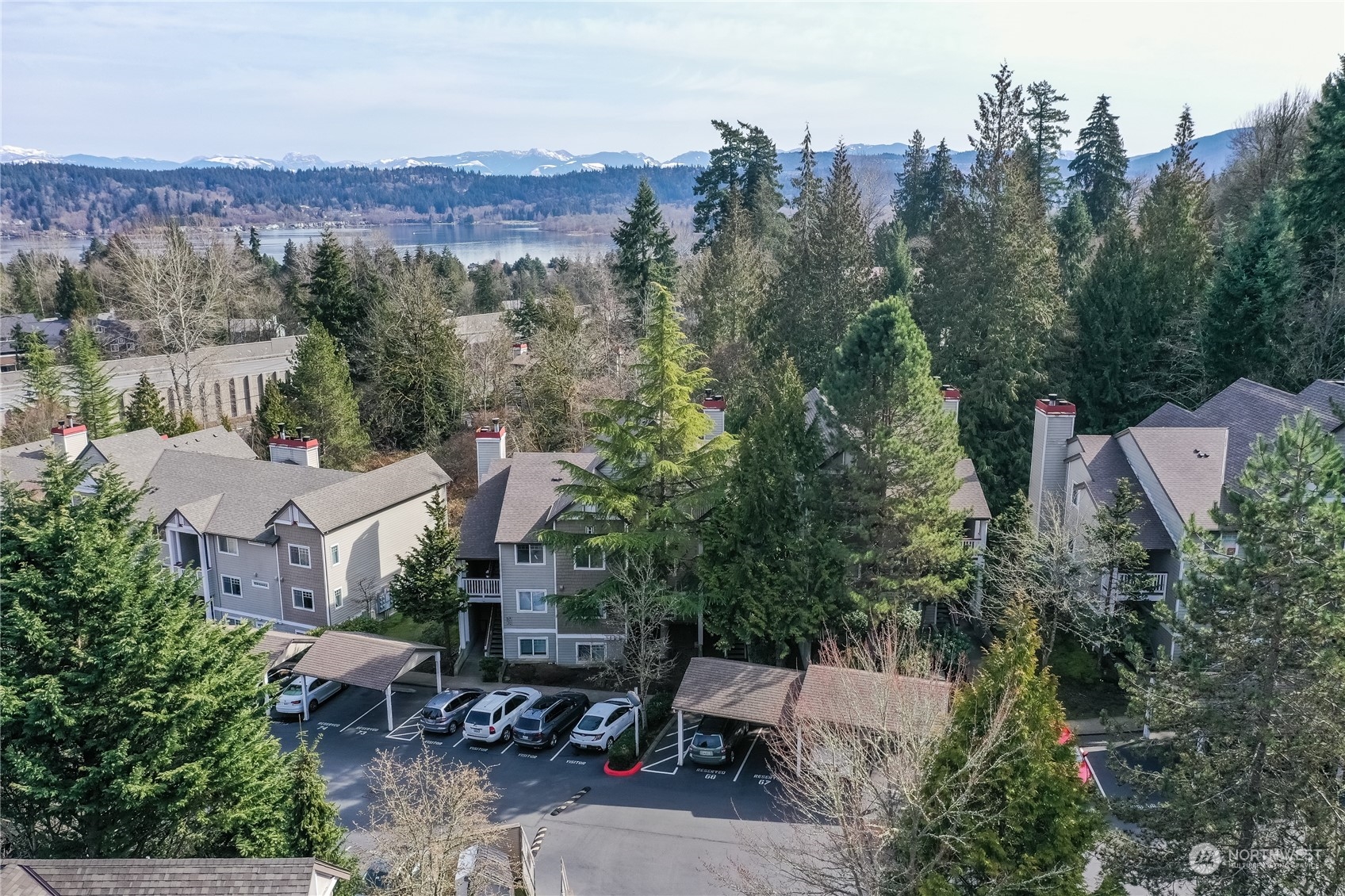 18501 Southeast Newport Way, Unit H236 Issaquah, WA 98027 - Photo 23 of 25 an aerial view of a house with yard and outdoor seating