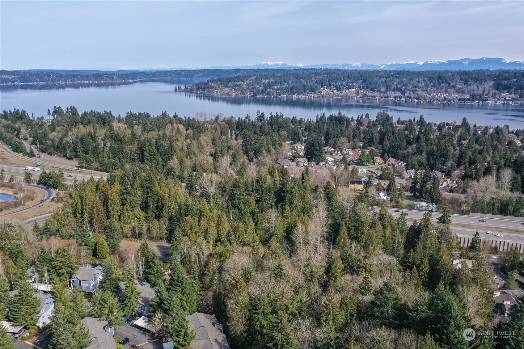 18501 Southeast Newport Way, Unit H236 Issaquah, WA 98027 - Photo 24 of 25 an aerial view of a city and mountain view