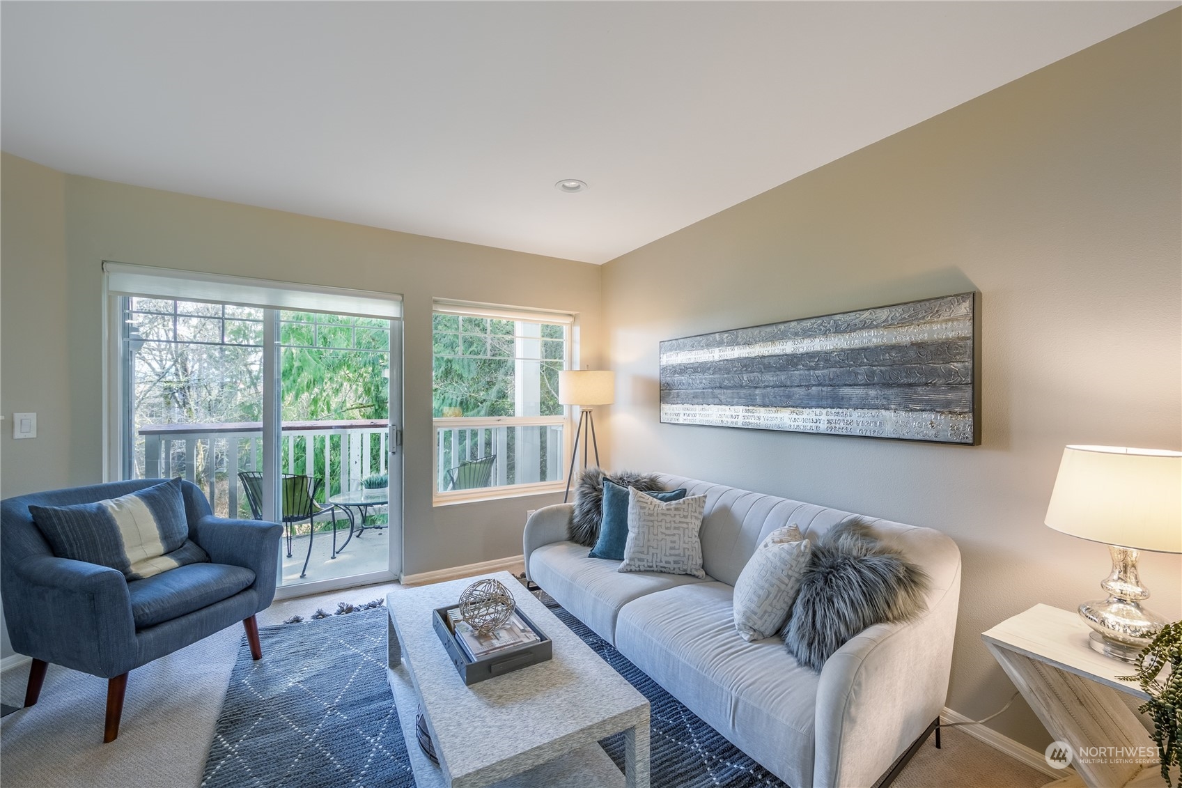 18501 Southeast Newport Way, Unit H236 Issaquah, WA 98027 - Photo 4 of 25 a living room with furniture and a large window