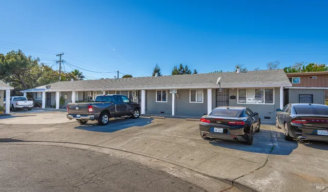a car parked in front of a house