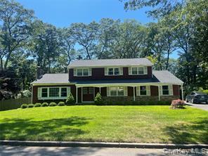 4 Cornwallis Road East Setauket, NY 11733 - Photo 1 of 16 a front view of a house with a yard